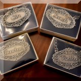 S12. Set of four Heritage Metal Works pewter liquor bottle tags. - $$6 each